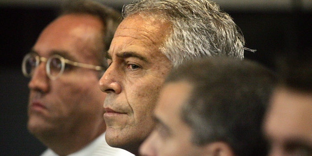 Jeffrey Epstein appears in court in West Palm Beach, Fla., July 30, 2008. A modeling agent who was close to the disgraced U.S. financier was found dead Saturday in his French jail cell, where he was being held in an investigation into the alleged rape and trafficking of minors for sexual exploitation, according to the Paris prosecutor's office. 